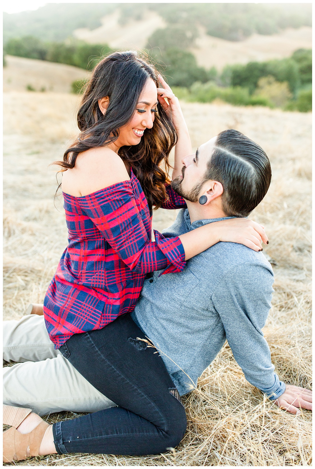straddle pose at engagement session
