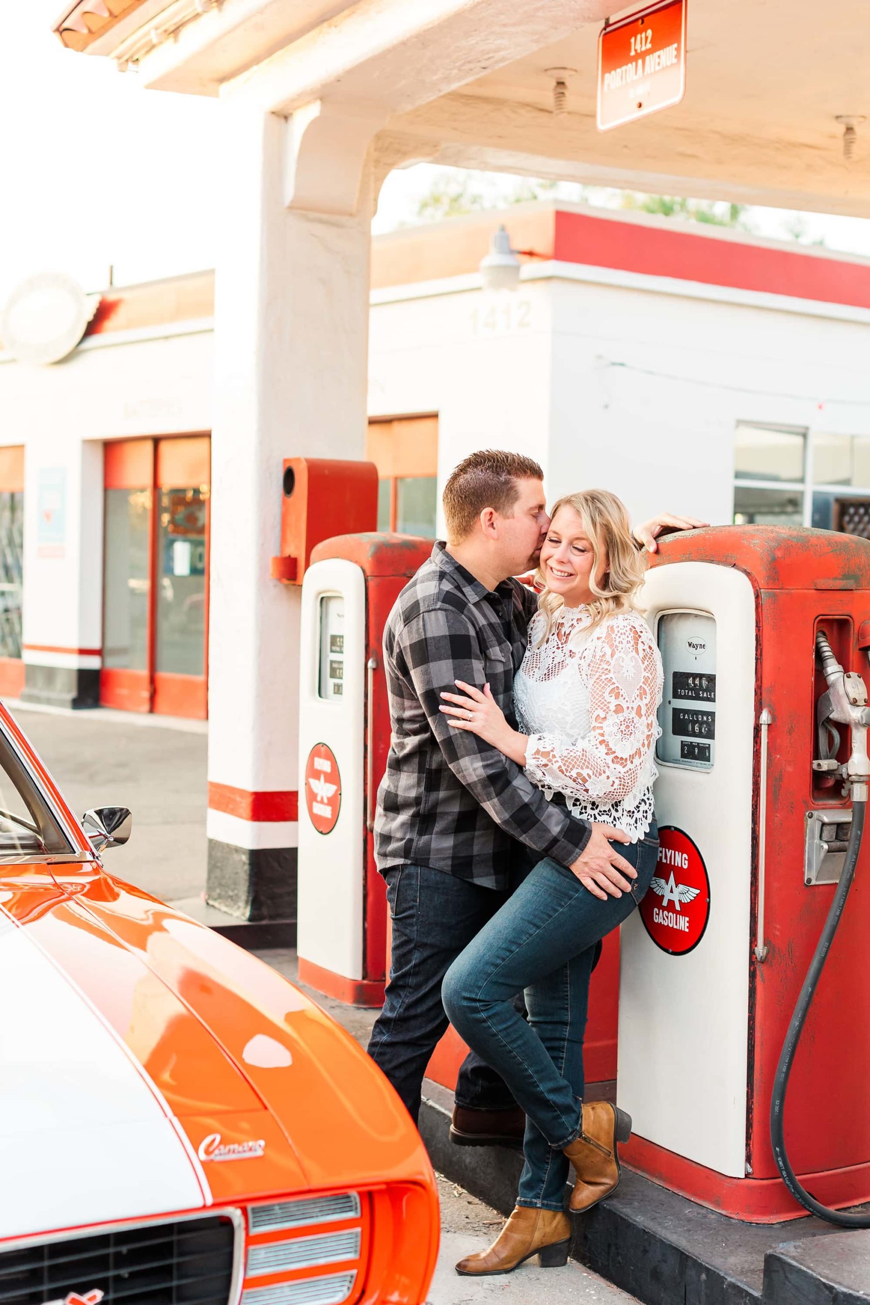 romantic photo at old gas station for engagement session