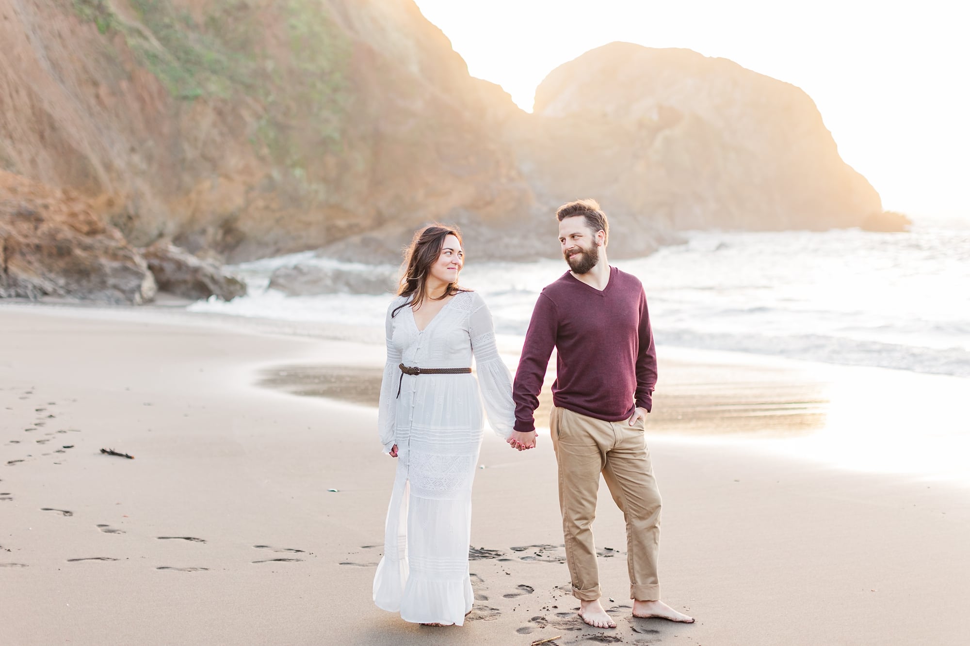 epic beach pose at engagement session