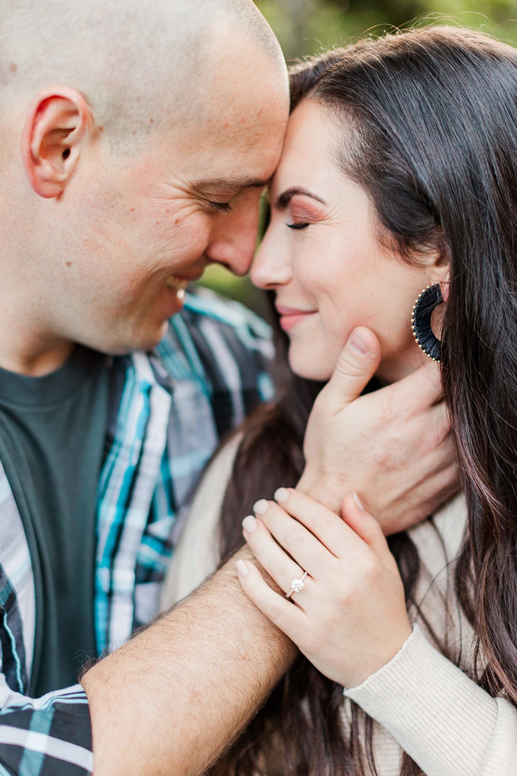 intimate moment between couple at engagement session