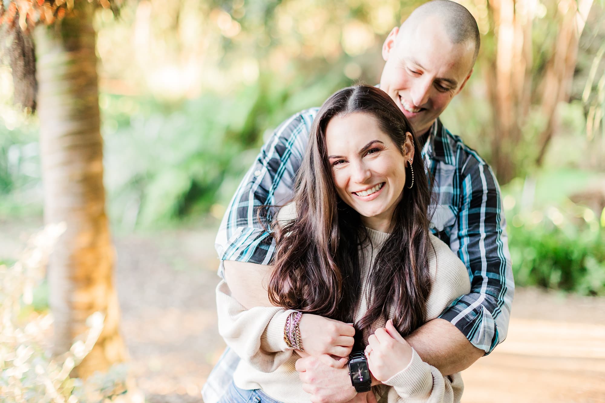 sneak attack pose at engagement session