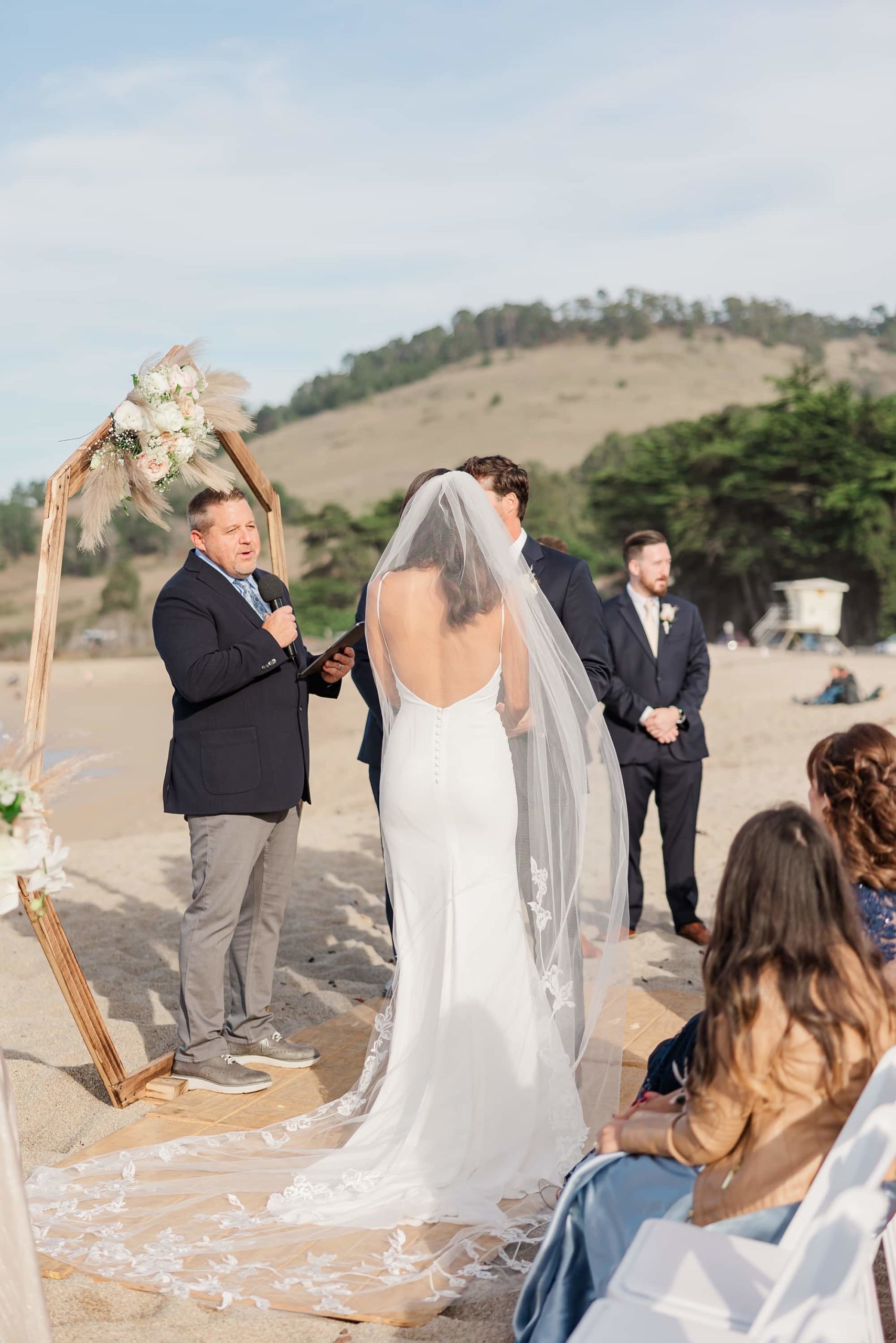 bride and groom at altar during carmel beach wedding