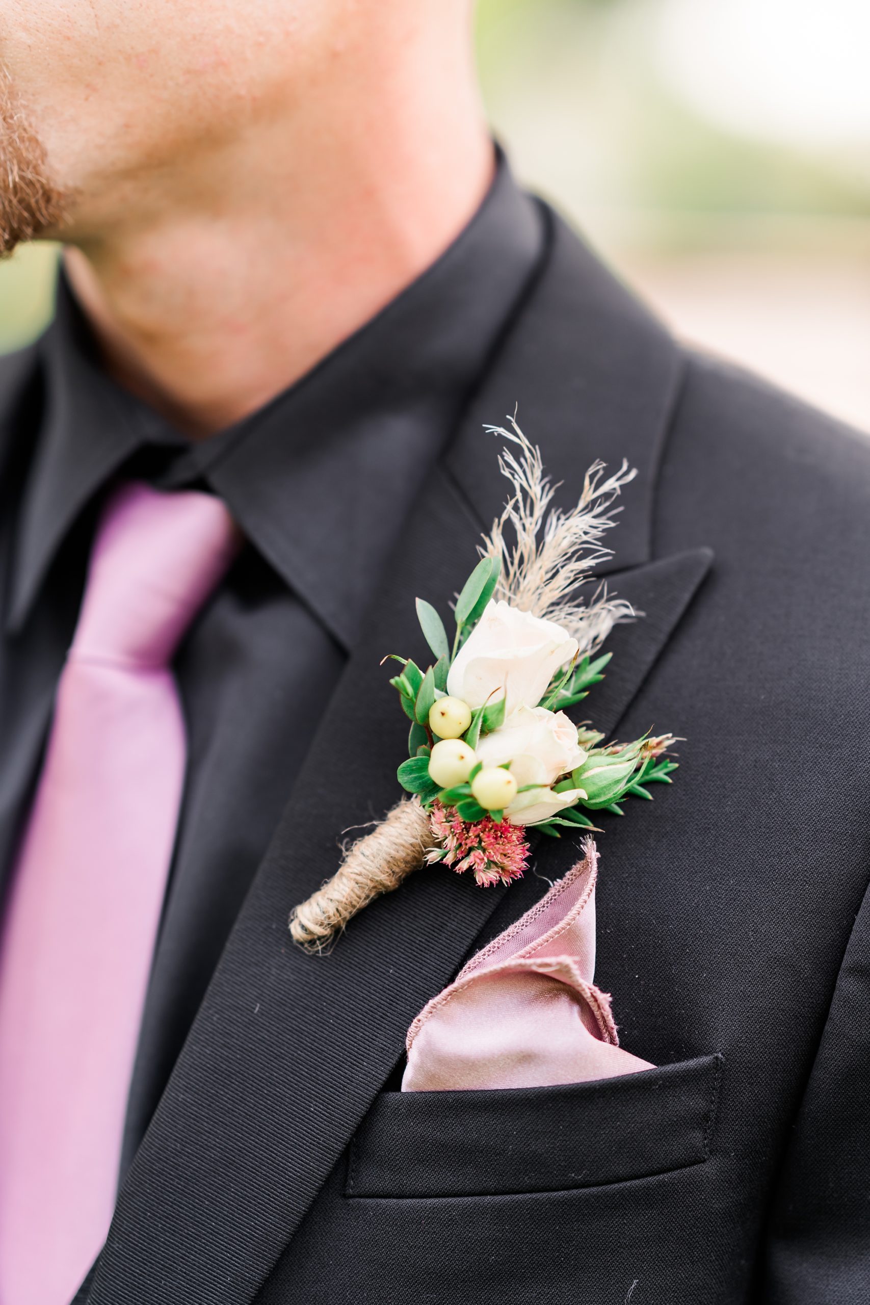 groom boutonniere detail photo