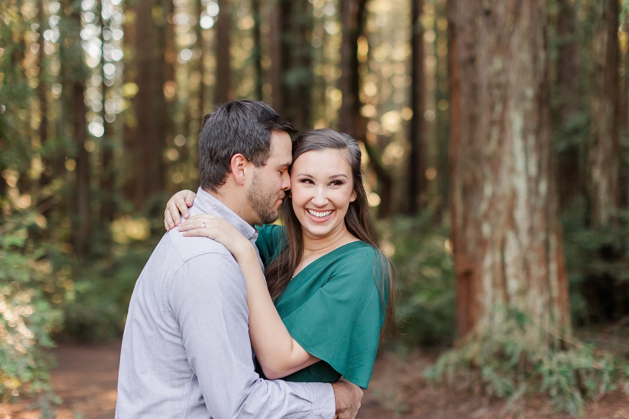 guy loving on his girl pose at engagement session