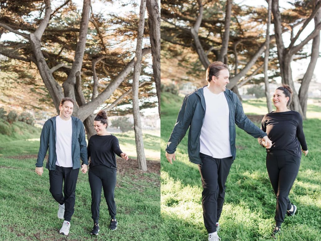 walking through lovers point park during monterey engagement photos