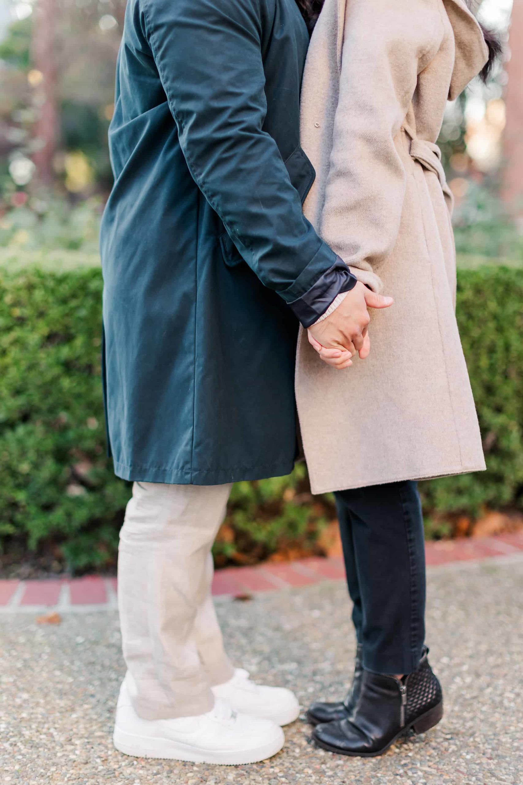 couple holding hands detail photo
