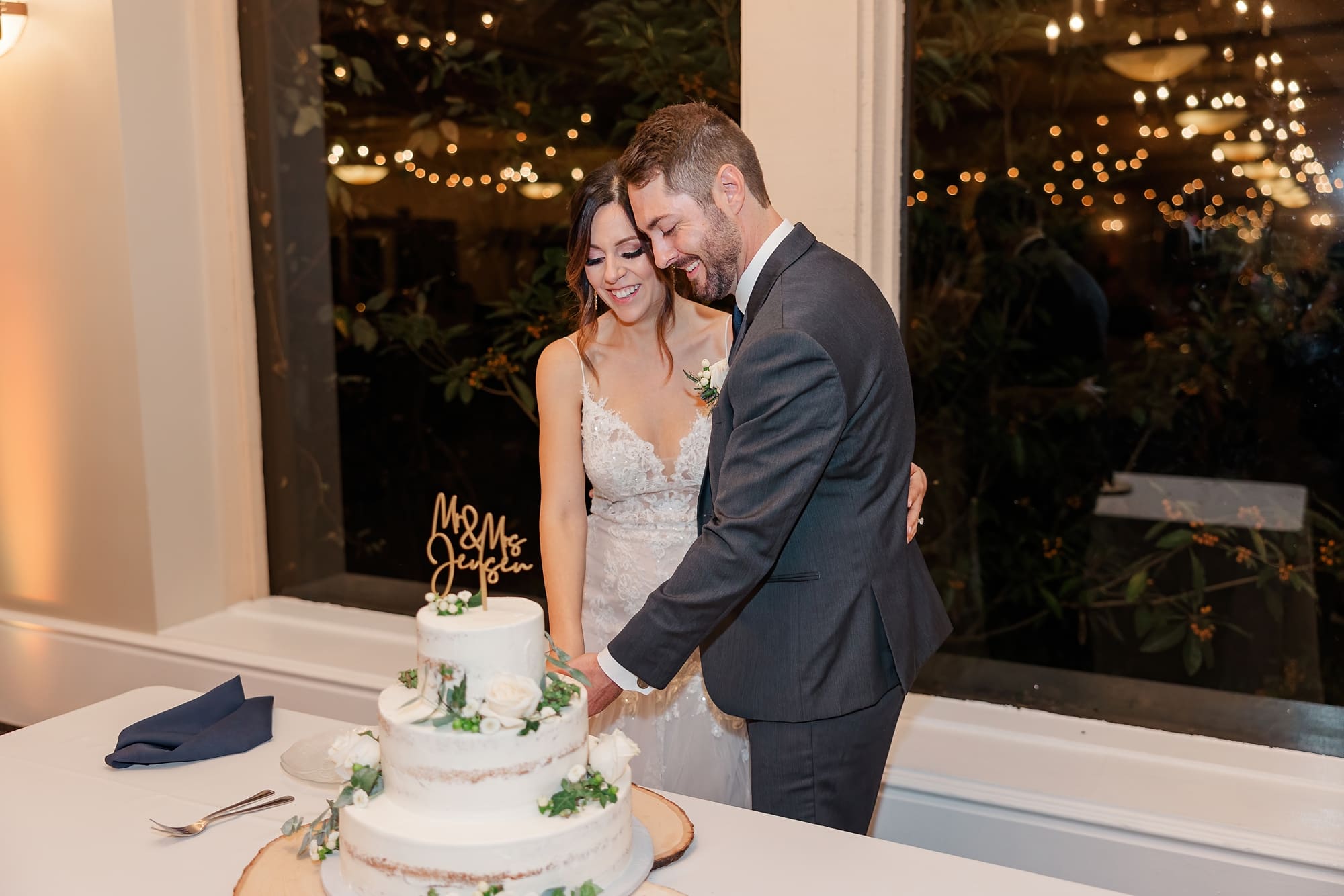 Cake cutting photos at wedding in Carmel