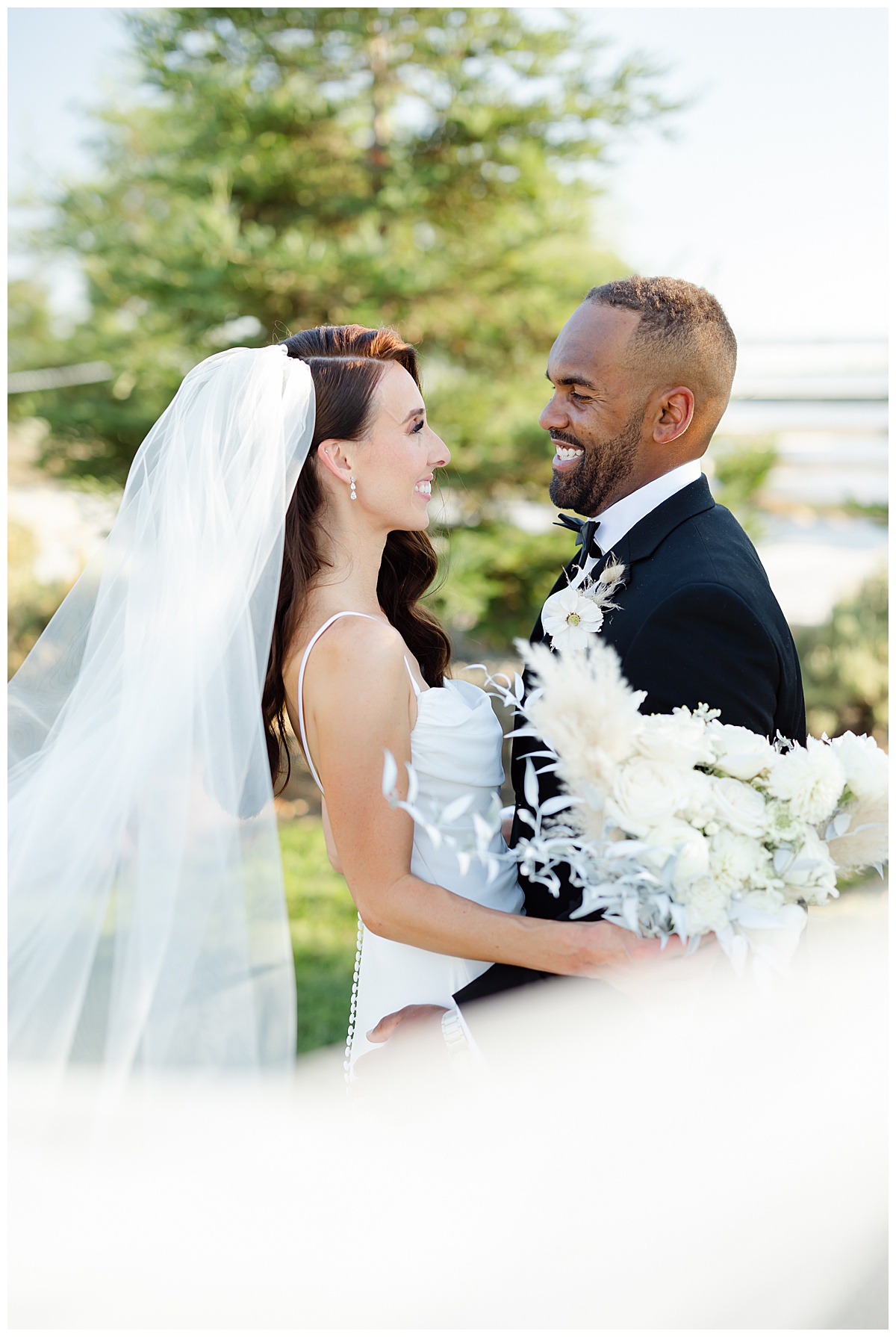 bride and groom veil photo